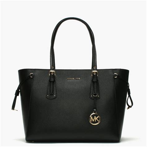 michael kors tas doorzichtig|Michael Kors leather tote.